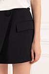 Balmain Asymmetrical wool mini skirt black - asymmetrical design. 100% wool. Closure: buttons . 2 side pockets, 2 back pockets. Country of manufacture: Italy. Care: specialized cleaning - photo 5
