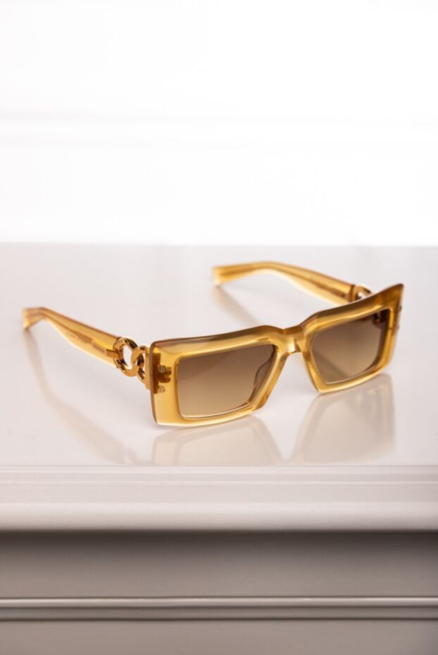 Women's yellow plastic sunglasses for sun protection - photo 2