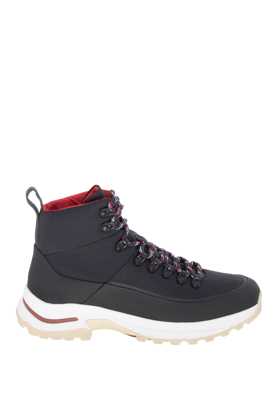 Blue trekking sneakers with a massive sole and anatomical heel