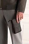 Black men's python leather clutch Cesare di Napoli - Structural leather. 100% python skin. Closure: Zipper. Two compartmentss. Country of manufacture: Italy. Care: specialized cleaning - photo 2