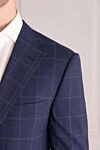 Corneliani Костюм мужской из шерсти синий - Декор: Шлица, узор клетка. Состав: 100% шерсть. Застежка: Пуговицы, крючок. Карманы (внешние): Нагрудный карман, два кармана с клапанами. Карманы (внутренние): Три кармана. Карманы брюк: Два боковых кармана, два кармана сзади на пуговицах. Подкладка: 100% купро. Страна производитель: Италия. Уход: специализированная чистка - фото 5