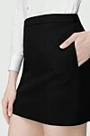Класична вовняна міні-спідниця чорного кольору Saint Laurent - 100% шерсть. Країна виробник: Італія. Догляд: спеціалізоване чищення - фото 6