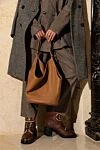 Women's brown boots made of leather and fur with a logo Valentino - Decoration: strap with buckle and logo. leather, fur. Sole height: 2 centimeters. lacing. Country of manufacture: Italy. Care: specialized cleaning - photo 6