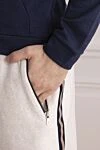 Brunello Cucinelli Шорты из хлопка и нейлона белые мужские - боковые полоски. 94% хлопок, 6% нейлон. молнии на карманах, кулиска. два боковых кармана, два кармана сзади. Страна производитель: Италия. Уход: специализированная чистка - фото 5
