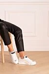 Кросівки білі жіночі Dolce & Gabbana - Логотип. 100% шкіра. Висота підошви: 3 см. Країна виробник: Италия. Догляд: спеціалізоване чищення - фото 2