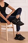 Кросівки чорні жіночі Balmain - логотип, отвори на підошві. 82% нейлон, 14% спандекс, 4% гума. Висота підошви: 7 см. шнурівка. Країна виробник: Франция. Догляд: спеціалізоване чищення - фото 2