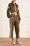 Gucci Костюм прогулянковий з поліестеру та бавовни коричневий жіночий - логотип по поверхні. дві кишені. 55% поліестер, 45% бавовна. еластичний пояс з зав'язкою, блискавка. Країна виробник: Италия. Догляд: спеціалізоване чищення - фото 3