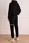 Костюм прогулочный из хлопка женский черный Givenchy - логотип. капюшон. 100%хлопок, . молния. два боковых кармана. Страна производитель: Франция. Уход: специализированная чистка - фото 4