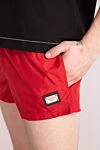 Dolce & Gabbana Red polyester beach shorts for men - brand logo. 100% polyester. zipper, drawstring. two front pockets, one back pocket. Country of manufacture: Italy. Care: specialized cleaning - photo 5