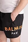 Balmain Шорти пляжні з поліестеру чоловічі чорні - доготип бренду. 100% поліестер. куліска. дві передні кишені. Країна виробник: Італія. Догляд: спеціалізоване чищення - фото 5