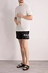 Men's black polyester shorts with logo Balmain - brand logo. 100% polyester. Closure: drawstring. two side pockets. Country of manufacture: Italy. Care: specialized cleaning - photo 2