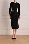Юбка из шерсти и эластана черная женская Dolce & Gabbana - логотип бренда. 98% шерсть, 2% эластан. молния. Страна производитель: Италия. Уход: специализированная чистка - фото 2