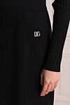 Dolce & Gabbana Юбка из шерсти и эластана черная женская - логотип бренда. 98% шерсть, 2% эластан. молния. Страна производитель: Италия. Уход: специализированная чистка - фото 5
