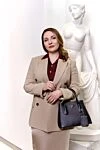 Женская черная сумка из натуральной кожи с логотипом Prada - логотип бренда, фактура кожи. 100% натуральная кожа. молния. Страна производитель: Италия. Уход: специализированная чистка - фото 8