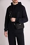 Сумка через плечо черная мужская из полиамида и натуральной кожи Prada - логотип бренда. 70% полиамид, 30% натуральная кожа. молния. карманы на молнии. Страна производитель: Италия. Уход: специализированная чистка - фото 2