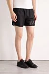 Balmain Men's black polyester beach shorts - brand logo. 100% polyester. Closure: drawstring. two side, two back pockets. Country of manufacture: Italy. Care: specialized cleaning - photo 3