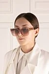 Очки солнцезащитные женские розовые из пластика Dior - логотип бренда. оправа из пластика. розовый. Страна производитель: Франция. Уход: специализированная чистка - фото 2