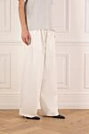 Balenciaga Women's white pants made of cotton and polyamide - brand logo. 52% cotton, 48% polyamide. Closure: drawstring. two side pockets. Country of manufacture: Italy. Care: specialized cleaning - photo 3