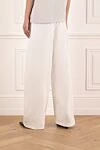 Women's white pants made of cotton and polyamide Balenciaga - brand logo. 52% cotton, 48% polyamide. Closure: drawstring. two side pockets. Country of manufacture: Italy. Care: specialized cleaning - photo 4