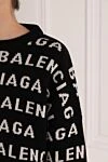 Balenciaga Women's black jumper with logo print - large brand logo pattern. 98% wool 2% polyamide. Country of manufacture: Italy. Care: specialized cleaning - photo 5