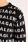 Balenciaga Женский черный джемпер с принтом с логотипом - паттерн крупного логотипа бренда. 98% шерсть 2% полиамид. Страна производитель: Италия. Уход: специализированная чистка - фото 5