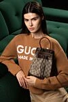 Сумка жіноча коричнева із текстилю. Gucci - червоно-зелена стрічка Web. текстиль. Розмір: Ш 20,5 х 26 х Г 11 см. Довжина ременя: знімний регульований плечовий ремінь заввишки 53 см. Ручка: шкіряна ручка заввишки 12 см. відкрита кишеня та кишенька для смартфона всередині. застібка у вигляді куліски. Країна виробник: Італія. Догляд: спеціалізоване чищення - фото 8