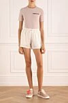 Women's white shorts on the backstage. Moncler - logo. 100% cotton. Closure: drawstring. two side pockets. Country of manufacture: Italy. Care: specialized cleaning - photo 2