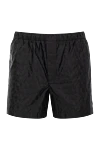 Valentino Black men's beach shorts with logo - logo pattern. 100% polyamide. Fastener: elastic band, zipper. two side pockets, one back pocket. Country of manufacture: Italy. Care: specialized cleaning - photo 1