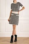 White women's costume with a goosefoot skirt D.Exterior - houndstooth pattern. 55% wool, 7% polyester, 38% viscose. Country of manufacture: Italy. Care: specialized cleaning - photo 2