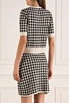 White women's costume with a goosefoot skirt D.Exterior - houndstooth pattern. 55% wool, 7% polyester, 38% viscose. Country of manufacture: Italy. Care: specialized cleaning - photo 4