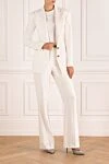 Summer suit with trousers for women white Balmain - branded buttons. 97% viscose, 3% elastane. Closure: buttons. two side pockets, one chest pocket. Country of manufacture: Italy. Care: specialized cleaning - photo 2