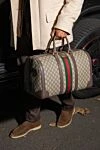 Дорожня сумка Savoy середнього розміру із легендарної канви GG Supreme Gucci - подвійна буква G. 60% поліуретан, 20% бавовна, 20% поліамід. Розміри: 44 см (Ш) x 28,5 см (В) x 24,5 см (Г). Довжина ременя: регульований ремінець з парусини. дві кишені на блискавці. застібка-блискавка. Країна виробник: Італія. Догляд: спеціалізоване чищення - фото 8