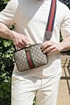 Маленькая сумка через плечо Ophidia бежевая Gucci - Double G. 60% полиуретан, 20% хлопок, 20% полиамид. Рамер: Ш 23,5 х В 16 х Г 4,5 см. Длина ремня: плечевой ремень высотой 50 см; длина: от 94 до 135 см. внутри: 1 карман на молнии. клапан на магнитной застежке. Страна производитель: Италия. Уход: специализированная чистка - фото 8