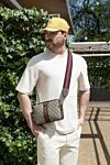 Gucci Маленькая сумка через плечо Ophidia бежевая - Double G. 60% полиуретан, 20% хлопок, 20% полиамид. Рамер: Ш 23,5 х В 16 х Г 4,5 см. Длина ремня: плечевой ремень высотой 50 см; длина: от 94 до 135 см. внутри: 1 карман на молнии. клапан на магнитной застежке. Страна производитель: Италия. Уход: специализированная чистка - фото 7