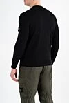 Черный джемпер мужской из шерсти с логотипом Stone Island - логотип бренда. 100% шерсть. Страна производитель: Италия. Уход: специализированная чистка - фото 4