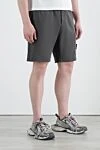 Stone Island Men's gray shorts with a pocket on the leg and a logo - brand logo. 100% cotton. Closure: drawstring zipper. two side pockets, leg pocket, one back pocket. Country of manufacture: Italy. Care: specialized cleaning - photo 3