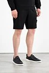 Stone Island Шорты мужские черные с карманом на штанине и логотипом - логотип бренда. 100% хлопок. молния кулиска. два боковых кармана, карман на штанине, один задний карман. Страна производитель: Италия. Уход: специализированная чистка - фото 3