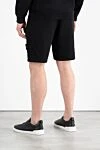 Шорты мужские черные с карманом на штанине и логотипом Stone Island - логотип бренда. 100% хлопок. молния кулиска. два боковых кармана, карман на штанине, один задний карман. Страна производитель: Италия. Уход: специализированная чистка - фото 4