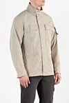 Stone Island Beige jacket with hood and asymmetrical pockets - asymmetric chest pockets, brand logo. hood. 100% polyester. buttons, zipper. two side pockets, two chest pockets. Country of manufacture: Italy. Care: specialized cleaning - photo 3