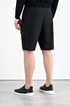 Шорты-карго из парусины черные мужские Stone Island - логотип бренда. 100% хлопок. кулиска. два боковых кармана, один задний карман, два кармана на штанине. Страна производитель: Италия. Уход: специализированная чистка - фото 4