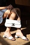 Celine Средняя сумка Lola из блестящей телячьей кожи - пряжка в ??виде логотипа. 100% телячья кожа, подкладка из овчины. Размеры:28 x 12 x 5 СМ. Длина ремня: регулируемый ремень с минимальной высотой 21 СМ и максимальной высотой 28 СМ. застежка Triomphe Metallic. один внутренний плоский карман. Страна производитель: Франция. Уход: специализированная чистка - фото 7