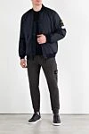 Бомбер темно-синий с логотипом на рукаве Stone Island - логотип бренда. 100% полиамид. кнопки, молния. два боковых кармана с клапанами. Страна производитель: Италия. Уход: специализированная чистка - фото 2