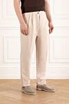 Brunello Cucinelli Beige loose tapered twill trousers with double pleats - tucks. 56% linen, 44% cotton. two side pockets, two back pockets. Fastener: drawstring. Country of manufacture: Italy. Care: specialized cleaning - photo 3