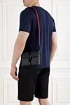 Super Mini GG Bag from the Cruise 2025 Collection Gucci - Web archive strip. 60% polyurethane, 20% polyester, 20% cotton. Dimensions: W 18.5 x H 13.5 x D 7 cm. Strap length: adjustable textile shoulder strap 55 cm high. three slots for plastic cards. Fastener: metal hook-and-loop fastener. Country of manufacture: Italy. Care: specialized cleaning - photo 2
