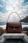 Tara medium bag made of genuine grained leather brown Tom Ford - hanging T-shaped branded fittings. 100% genuine leather. Dimensions: 36.5 X 25 X 12 CM. Belt length: shoulder strap 51 cm. external flat pocket. magnetic clasp. Country of manufacture: Italy. Care: specialized cleaning - photo 6