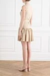 Acacia Metallic Cream Gold Knit Mini Dress Zimmermann - brand logo. 85% viscose, 6% metallic, 5% polyamide, 4% elastane. Fastener: belt. Country of manufacture: Italy. Care: specialized cleaning - photo 4