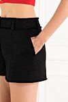 Dolce & Gabbana Women's black raschel tweed shorts - brand logo. 67% wool, 27% viscose, 6% polyamide. zip and grosgrain covered button with DG logo. French pockets. Country of manufacture: Italy. Care: specialized cleaning - photo 5