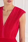 Balmain Двоколірна розкльошена трикотажна сукня червоного кольору - ребристий візерунок. 85% віскоза, 15% поліестер. Застібка-блискавка із золотистого металу на спині. Країна виробник: Італія. Догляд: спеціалізоване чищення - фото 5