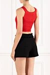 Укороченный трикотажный топ с пуговицами красного цвета Balmain - фирменные пуговицы. 84% вискоза, 16% полиэстер. Страна производитель: Франция. Уход: специализированная чистка - фото 4