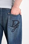 Dolce & Gabbana Джинсы свободного силуэта из хлопка с вышитым логотипом синие - потертости. 100% хлопок. молния. пять карманов. Страна производитель: Италия. Уход: специализированная чистка - фото 5